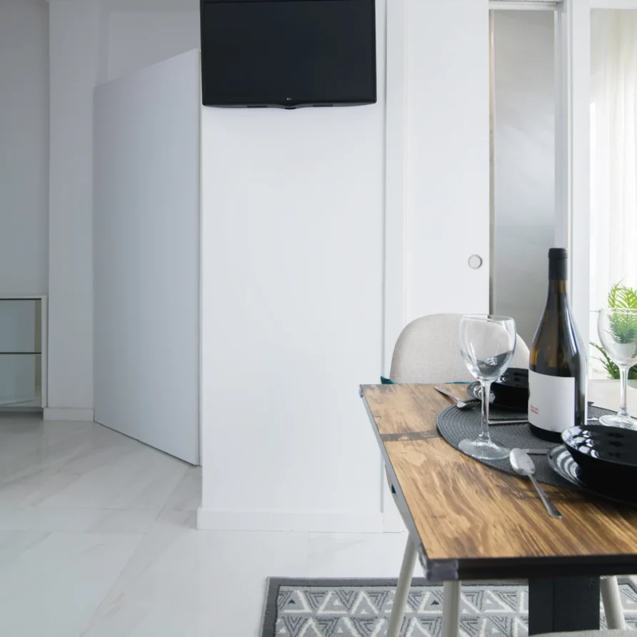 Modern dining area with table set
