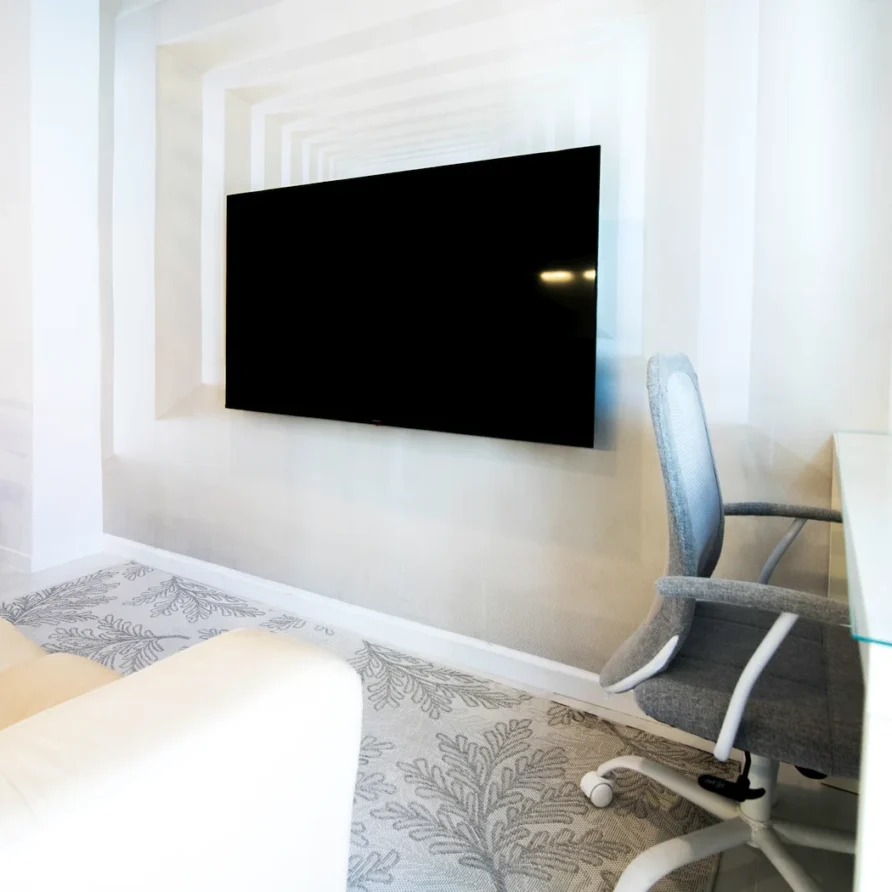 Wall-mounted TV in a modern room