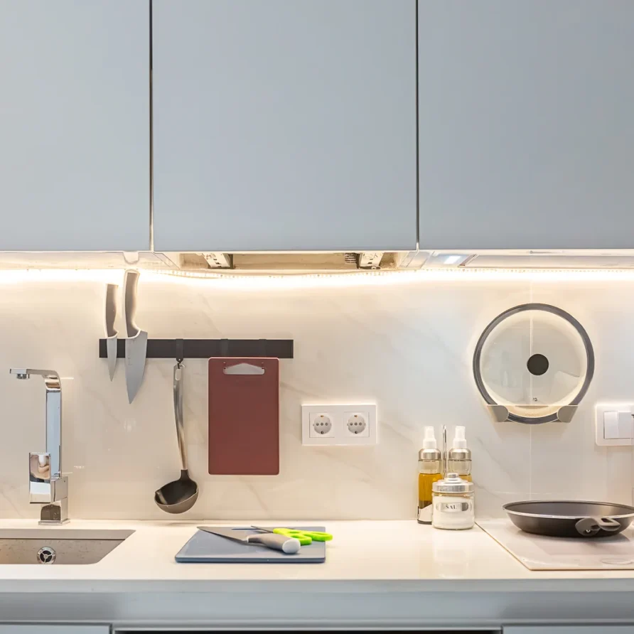 Modern kitchen with countertop and utensils
