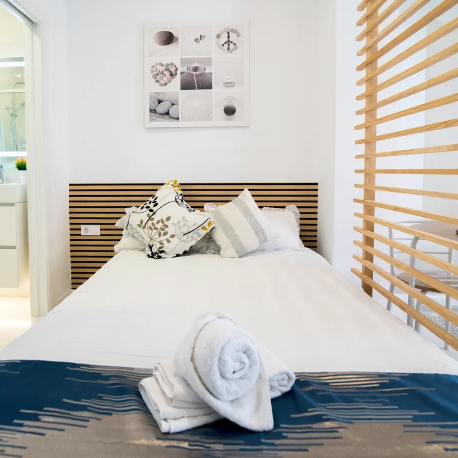 Modern bedroom with a white bed